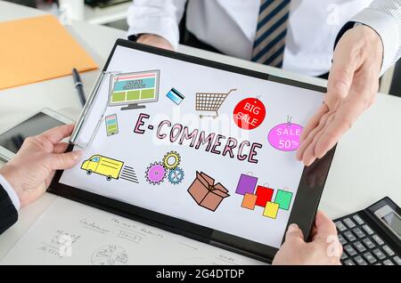 E-commerce concept shown by a businessman Stock Photo