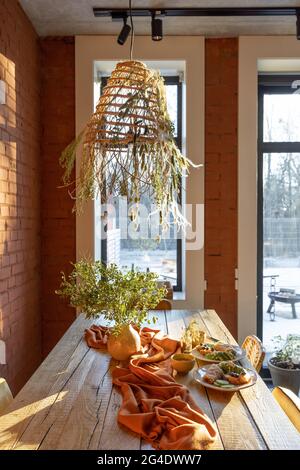 Dining place with a wooden table Stock Photo