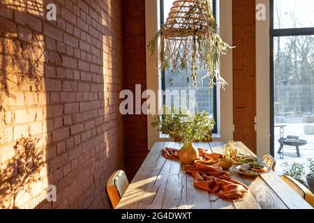 Dining place with a wooden table Stock Photo
