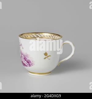 . Coffee cup, purple painted with winged putti floating on clouds. Along the edge a guilloches band with dependent flour glulands. Marked with a stork in blue under the glaze. N.B. German porcelain painted in The Hague. Stock Photo