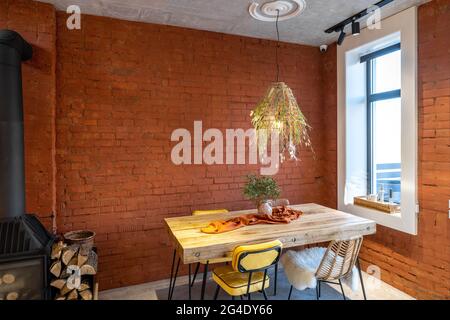 Dining place with a wooden table Stock Photo