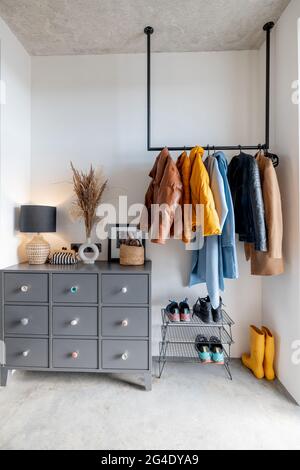 House hallway interior with clothes and furniture Stock Photo