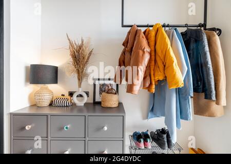 House hallway interior with clothes and furniture Stock Photo