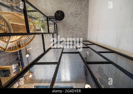 Glass partition to the home office in loft style Stock Photo