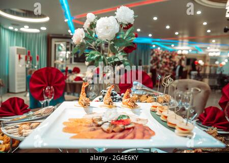 a plate of seafood in a restaurant on a holiday. Stock Photo