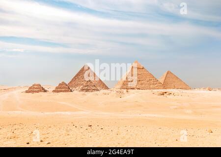 Egypt. Cairo - Giza. General view of pyramids from the Giza Plateau. three and the satellite pyramids, in background: the Pyramid of Menkaure Mykerino Stock Photo