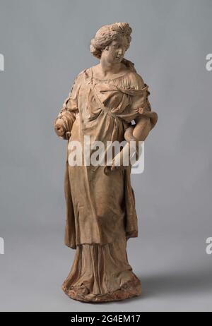. Both façades of the Town Hall are surmounted by three bronze statues ...