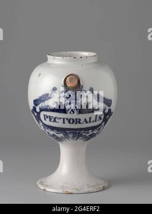 . Pharmacist spot from faience. With ear and spout and blue painted label with inscription: s / pectoralis Stock Photo