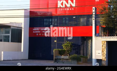 Facade of language school. School in Brazil teaching English, Spanish, German and French, Brazil, South America with parking for cars in panoramic vi Stock Photo