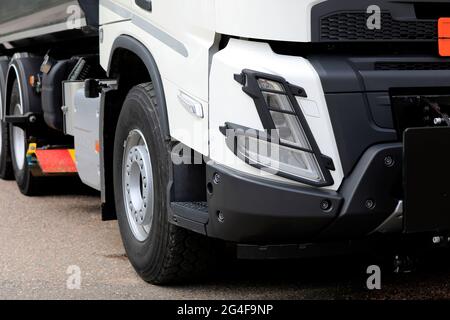New, white Volvo FMX heavy duty truck for construction parked on a