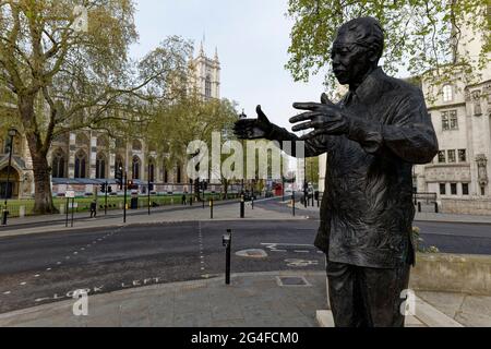 Bronze statue of Nelson Mandela by sculptor Ian Wallace standing in the  South West corner of Parliament Square Garden in Westminster London Stock Photo