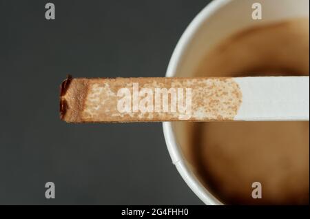 drunk espresso coffee in paper cup with  stick Stock Photo