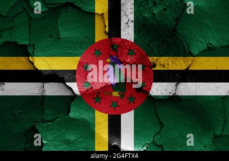 flag of Dominica painted on cracked wall Stock Photo