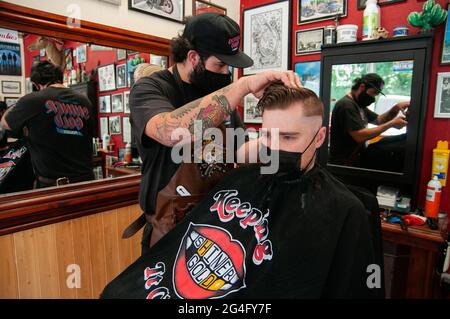 Inside an American style barbershop in the UK Stock Photo