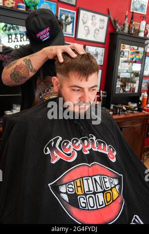 Inside an American style barbershop in the UK Stock Photo