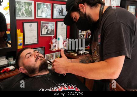 Inside an American style barbershop in the UK Stock Photo