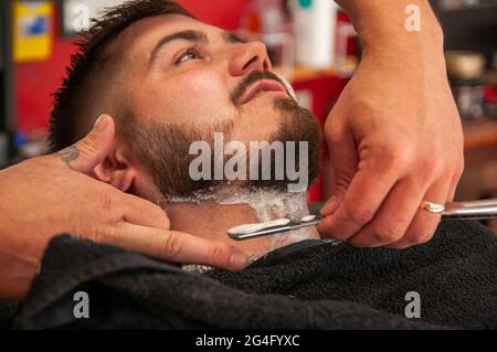 Inside an American style barbershop in the UK Stock Photo