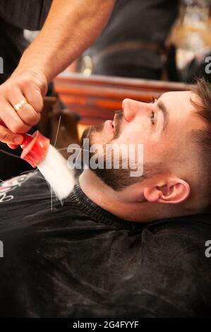 Inside an American style barbershop in the UK Stock Photo