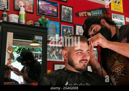 Inside an American style barbershop in the UK Stock Photo