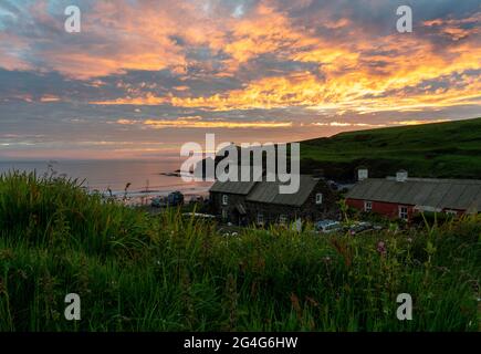Sunset over Abereiddi on the Pembrokeshire coast in South Wales UK Stock Photo