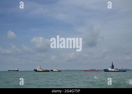 BATAM, INDONESIA - Aug 06, 2019: Tugboat sailing in the sea. Tugboat making maneuvers, Tanjung Pinang Riau Islands, August 6, 2019 Stock Photo