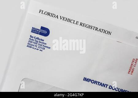 DMV Florida registration tag renewal service notice letter for Miami Dade County Tag agency. Florida Vehicle Registration Stock Photo