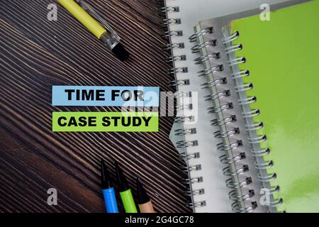 Time For Case Study write on sticky notes isolated on Wooden Table. Stock Photo