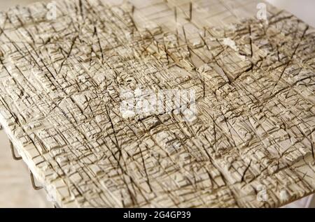 Detail of wood used to cut construction material Stock Photo