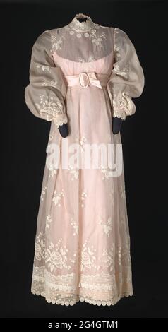 Dress worn by Diahann Carroll as the character Julia Baker on the television show &quot;Julia.&quot; The pink and cream dress is a full-length, long-sleeved gown with a high neck. African-American actress, singer, model, and activist Diahann Carroll (1935-2019) rose to prominence in some of the earliest major studio films to feature black casts, including Carmen Jones (1954) and Porgy and Bess (1959). Stock Photo