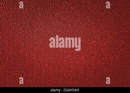 Selective focus abstract red background. Red classic background with dark vignette. Christmas red background. Stock Photo
