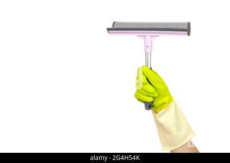 Spring cleaning concept. Washing windows theme. Hand holding a pink scraper windows isolated on a white background. Housework concept. Stock Photo