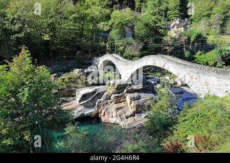 The ancient double arch stone bridge in Lavertezzo. Switzerland, Europe. Stock Photo