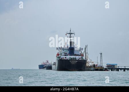 BATAM, INDONESIA - Aug 06, 2019: Tugboat sailing in the sea. Tugboat making maneuvers, Tanjung Pinang Riau Islands, August 6, 2019 Stock Photo