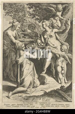 . The goddess Venus sits under a tree and is surrounded by nymphs and putti offering gifts: bowls with fruits, flowers and birds. The print has a Latin caption. Stock Photo
