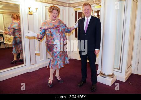 Culture Secretary Oliver Dowden poses for a photograph with Michael Ball, who plays Edna Turnblad, on the opening night of the musical Hairspray at the London Coliseum. Picture date: Monday June 21, 2021. Stock Photo
