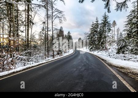 Winter streets sourround wood in Germany Stock Photo
