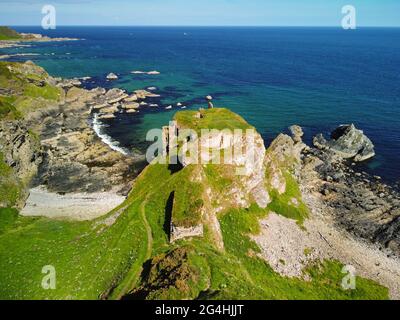 Aerial view from drone of ruins of Findlater Castle on Moray Firth in Aberdeenshire, Scotland, Uk Stock Photo