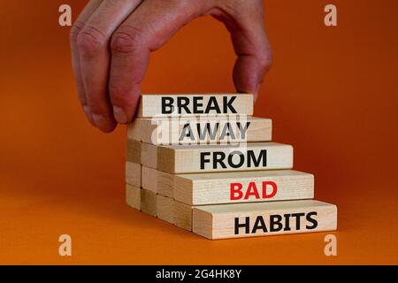 Break away from bad habits symbol. Wooden blocks with words Break away ...