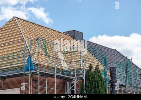 new roof covering on residential building Stock Photo