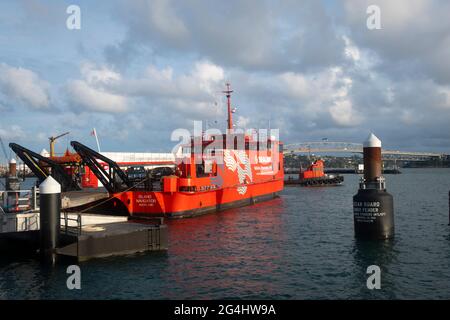 Ferry to Great Barrier Island loading at wharf in Auckland, North Island, New Zealand Stock Photo