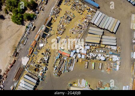 Aerial view industry recycle old machine technician separate classification part of irons metals