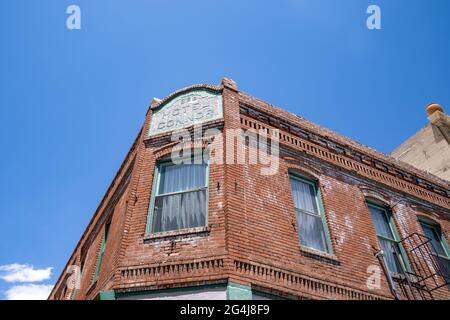 Jerome, Arizona - May 10, 2021: Exterior facade and sign for the old Hotel Connor, a haunted hotel Stock Photo