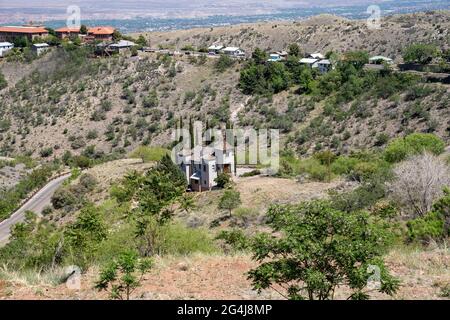 Jerome, Arizona - May 10, 2021: View of the Arizona landscape as seen from the city of Jerome, in the sunshine, with the Grand Hotel Stock Photo