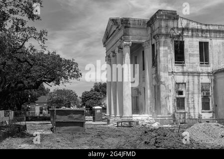 NEW ORLEANS, LA, USA - JUNE 14, 2021: Historic Carrollton Courthouse during renovation (in black and white) Stock Photo
