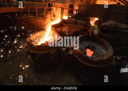 Special metallurgical ladles. The process of pouring molten metal Stock Photo