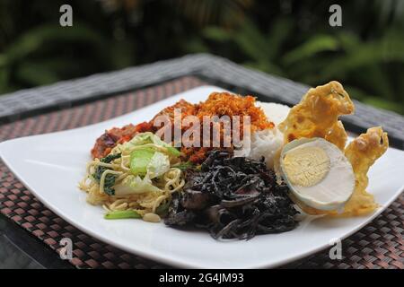 delicious stir fried squid with black ink sauce Stock Photo