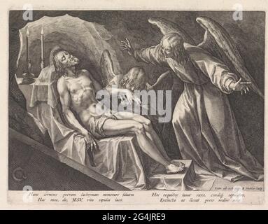 Paid Christ by two angels. In the tomb, the dead body of Christ is on the tombstone. An angel is kneeling for the body and kisses the left hand. The second angel stands before spreading arms. On the tomb two burning candles. Stock Photo