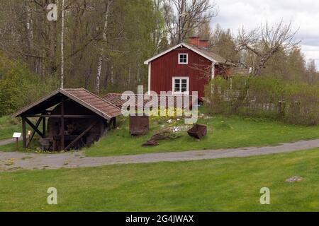 PERSHYTTAN, SWEDEN ON MAY 18, 2021. Outdoor view of the old folk museum, Iron foundry. Buildings and equipment. Editorial use. Stock Photo