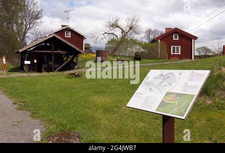 PERSHYTTAN, SWEDEN ON MAY 18, 2021. Outdoor view of the folk museum, information board. Buildings and equipment. Editorial use. Stock Photo