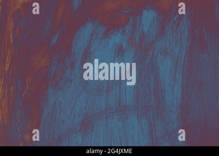 Background of a stone wall with smeared blue and purple paint on it Stock Photo